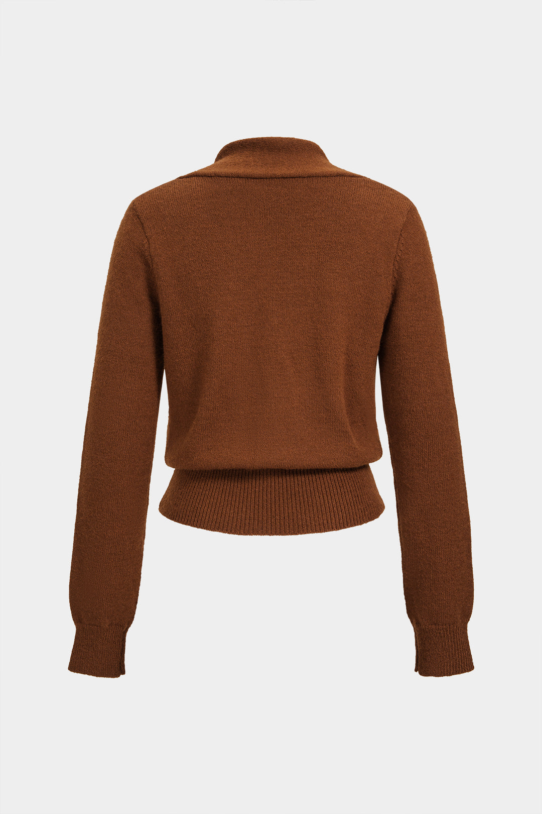 Gebreide metallic top met knoopjes en knoopdetail