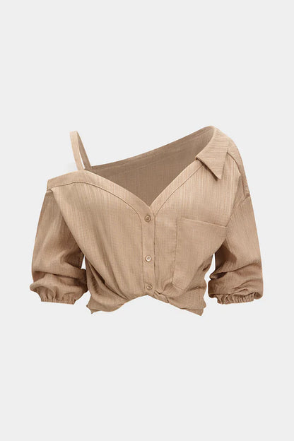 Asymmetrische, mouwloze blouse met knoopsluiting en open rug