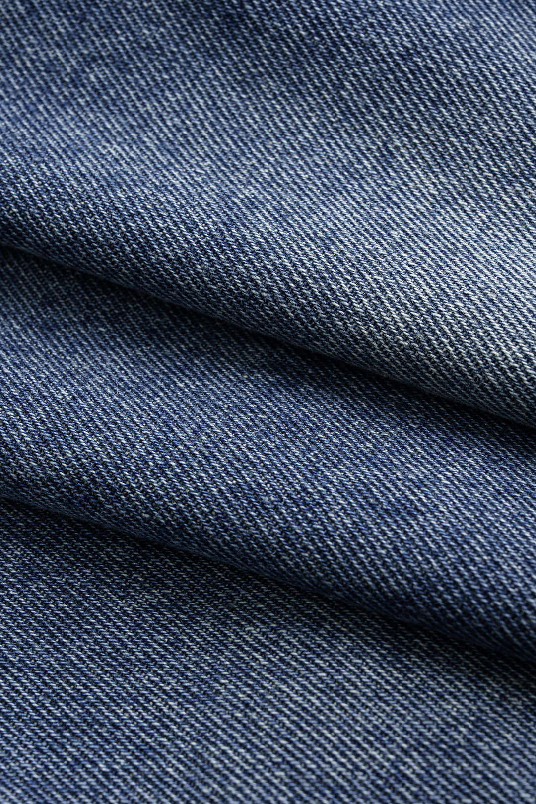 Denim asymmetrische rok met knoopjes