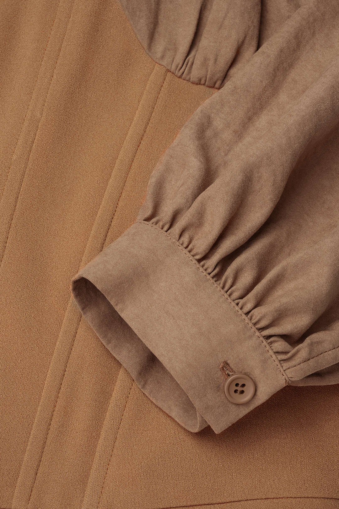 Liv - Patchwork body met knoopjes en lange mouwen
