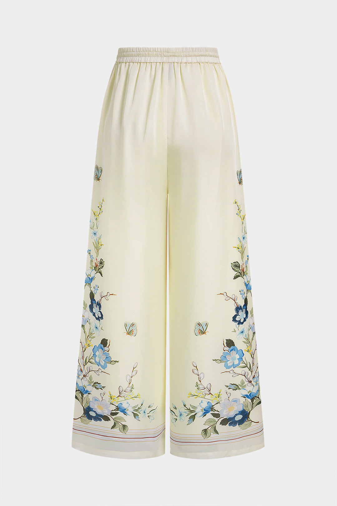 Bloemenprint metallic broek met strik en knoopjes
