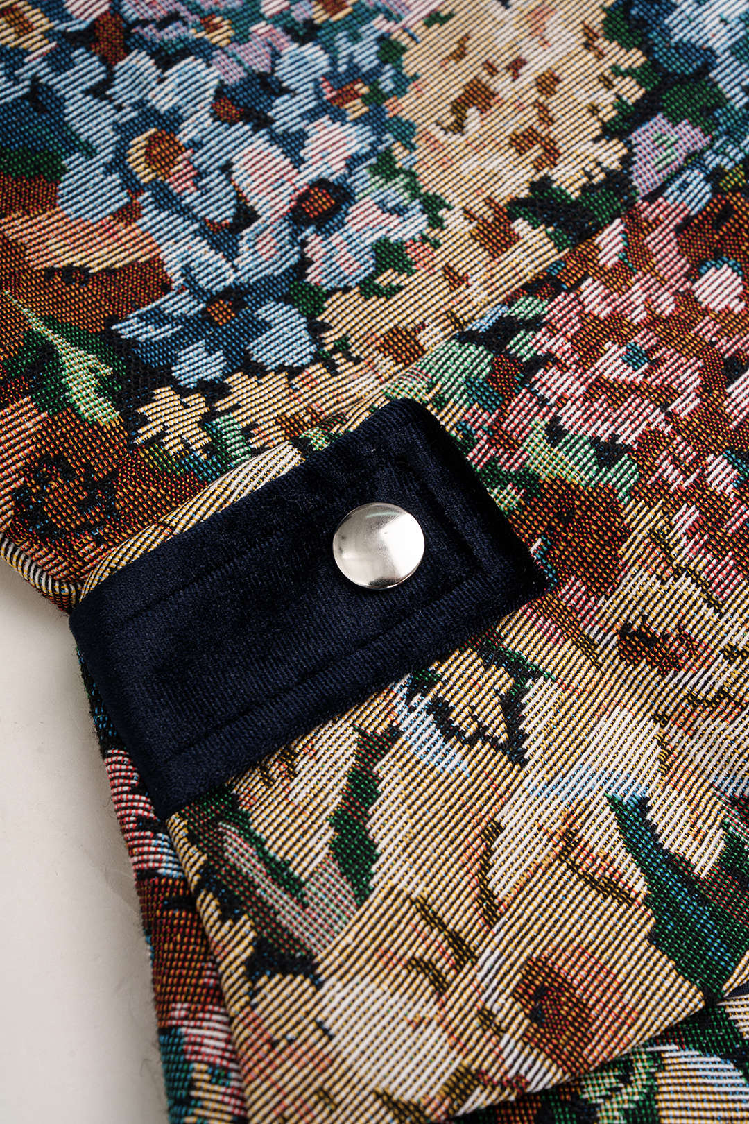 Jacquard patchwork jasje met revers en rits