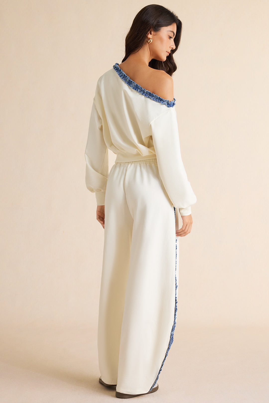 Patchwork denim sweater met één schouder