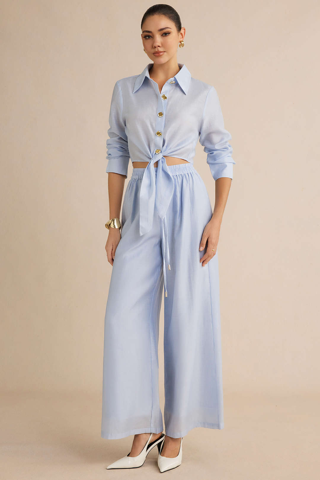 Greta - Metallic blouse met knoopjes en lange mouwen