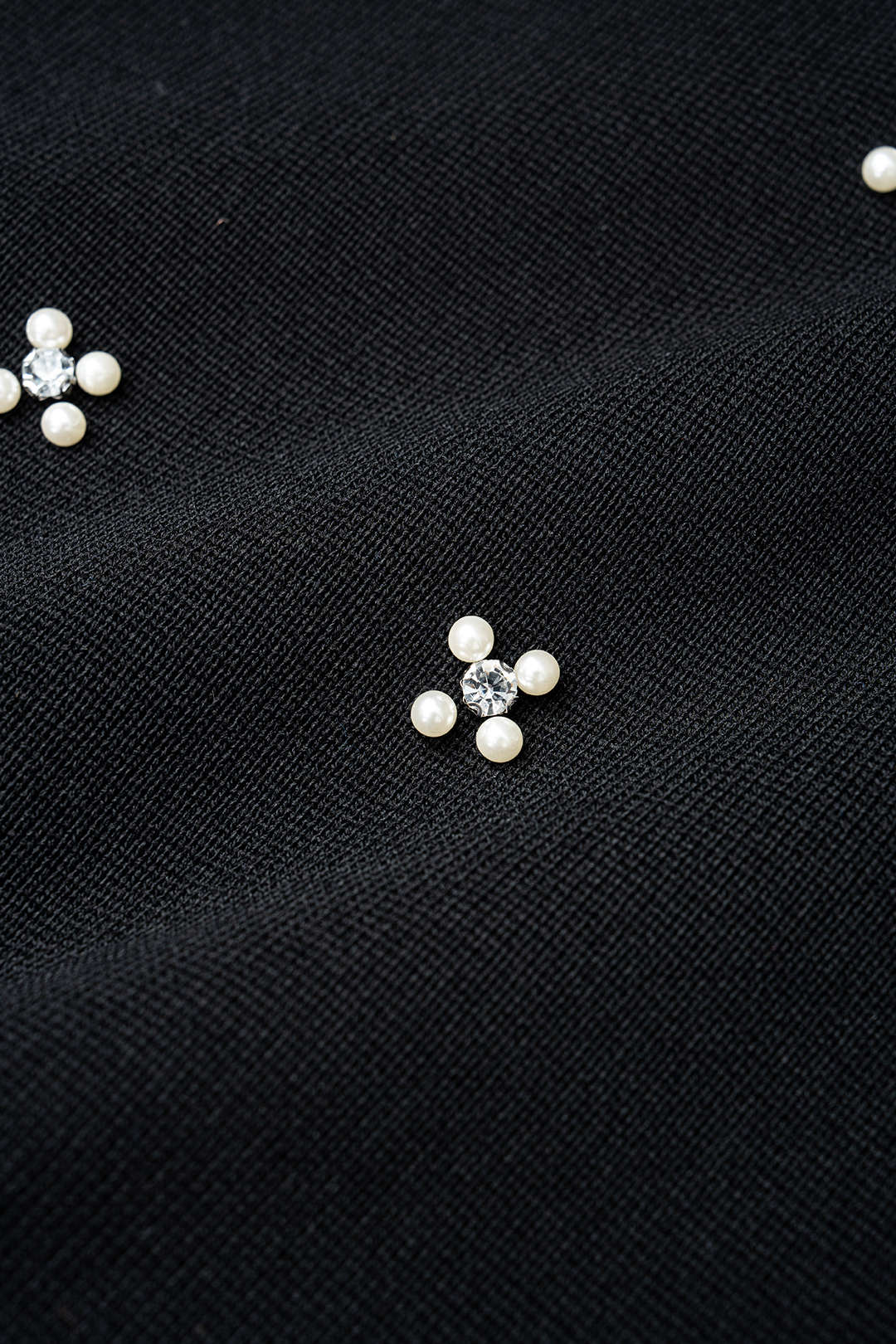Gebreide mouwloze maxijurk met ronde hals en strass