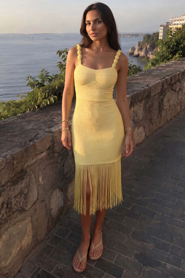 Mouwloze midijurk met franjes en spaghettibandjes
