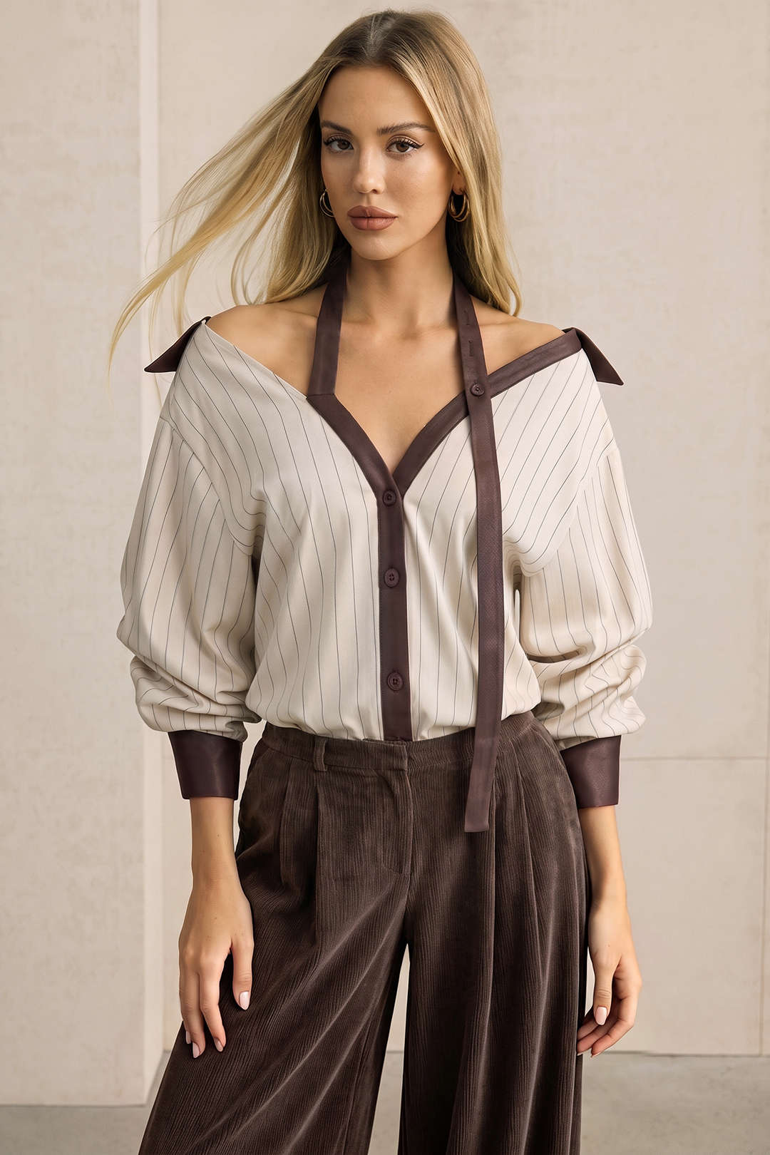 Gestreepte asymmetrische blouse met lange mouwen