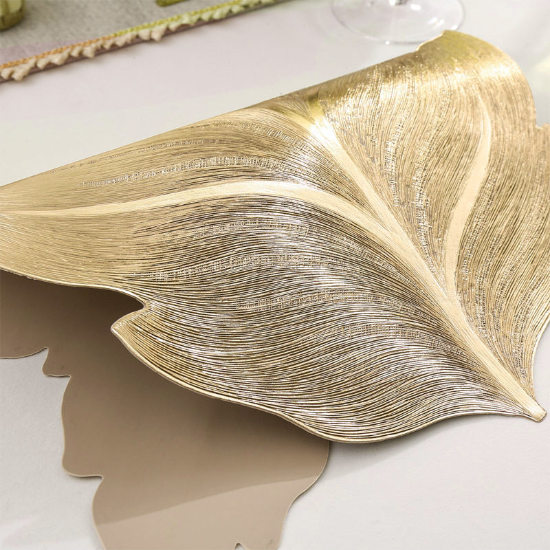 🎉Nieuwjaarscadeau 50% korting! 🌟Goudkleurige 3D-blad-placemat – Luxe tafeldecoratie, hittebestendig en waterdicht: perfect voor feestjes en dagelijks gebruik!
