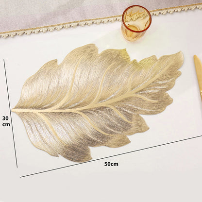 🎉Nieuwjaarscadeau 50% korting! 🌟Goudkleurige 3D-blad-placemat – Luxe tafeldecoratie, hittebestendig en waterdicht: perfect voor feestjes en dagelijks gebruik!