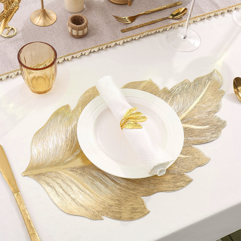 🎉Nieuwjaarscadeau 50% korting! 🌟Goudkleurige 3D-blad-placemat – Luxe tafeldecoratie, hittebestendig en waterdicht: perfect voor feestjes en dagelijks gebruik!